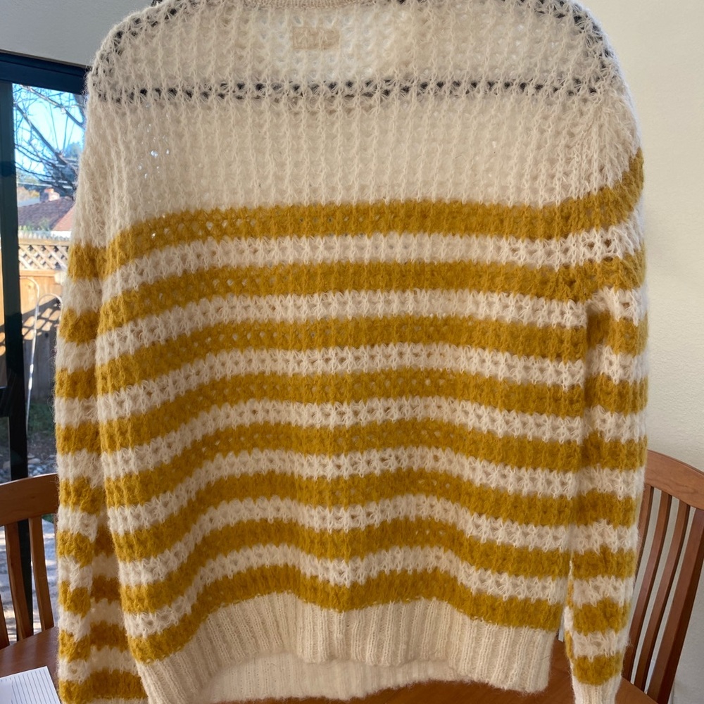 Super cute marigold and white sweater. Alpaca/cotton/polyamide blend.